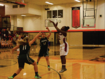 Junior Mary Brocker makes a jump shot at home
on December 8th against Tigard High School. 