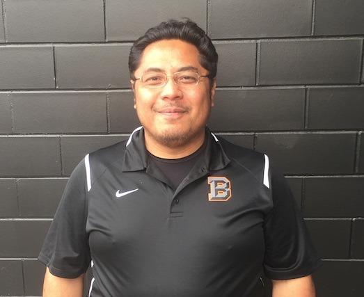 Headshot of newest volleyball coach, Alfred Tualagi.