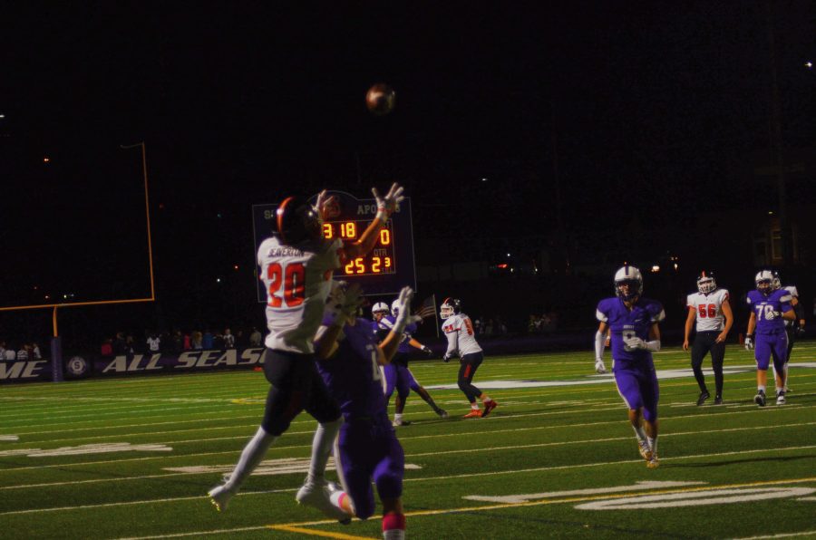 Receiver Mataio Talalemotu jumps up in the end zone against Sunset during the regular season for a touchdown on October 28th. 