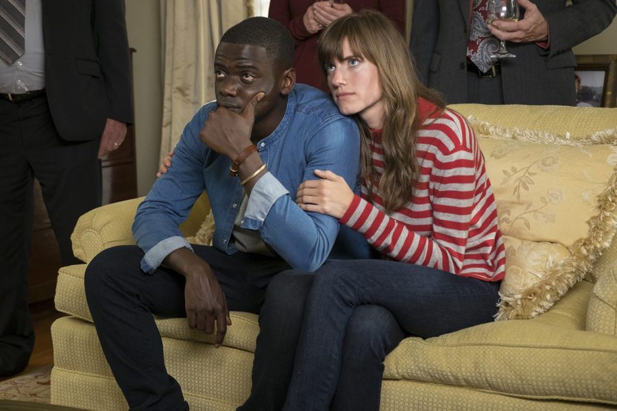 Main character Chris Washington (Daniel Kaluuya) and wife Rose Armitage (Allison Williams) at Rose's house for a family gathering.