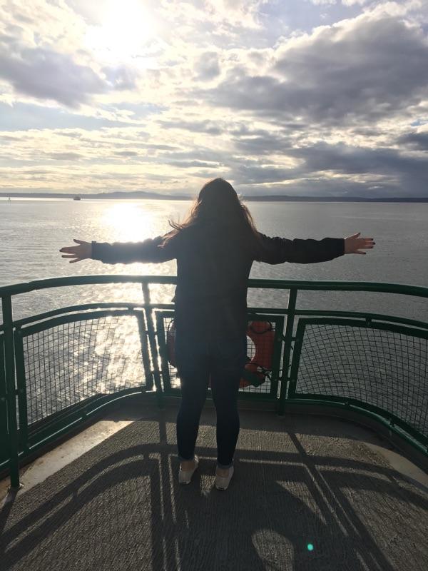 Senior Alona Arneson imitating the famous Titanic scene on the way to Bainbridge on the Washington State Ferry.