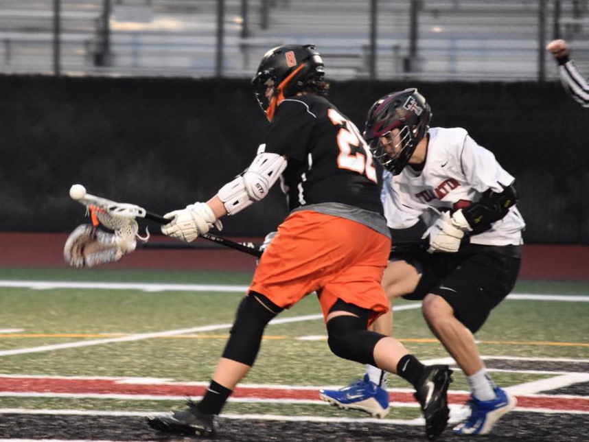 Boys+Lacrosse+in+a+game+against+Tualatin+High+School.