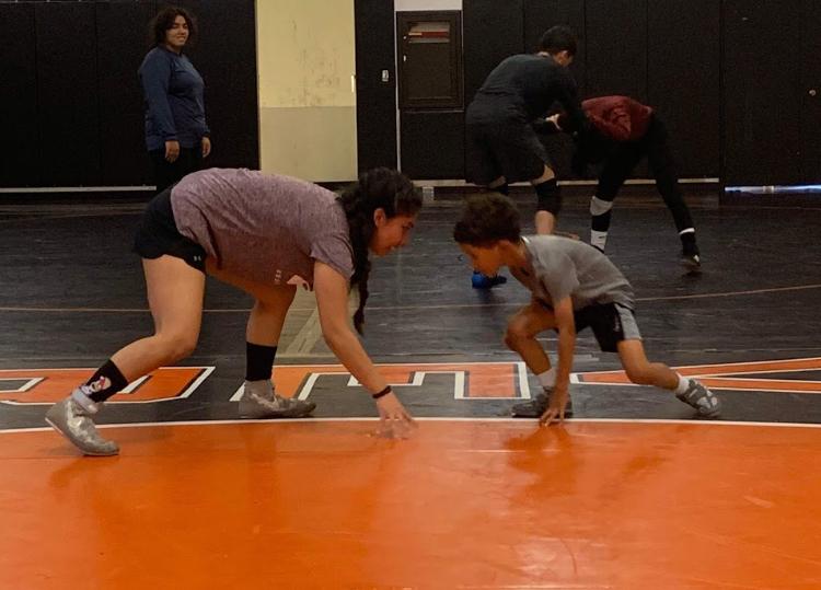 Wrestler Sylvia Almaguer faces off with an opponent