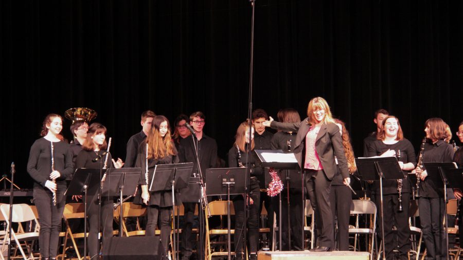 Band director Mary Bengel shows off the combined Concert and Symphonic Bands at their concert.