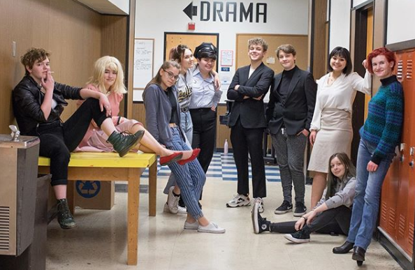 The Odd Couple cast and crew poses in the hallway. Left to right: Isabel Foster, Sydney Wright, Romie Avivi Stuhl, Keda Kinder, JJ Herman, Nic Deboy, Ethan Ohm, Quaye Dydasco, Riley Vinson, and Jessani Blakely. Not pictured: Edison Youngs, Dane Ganis, Toby Thompson, and Virgil Foster.