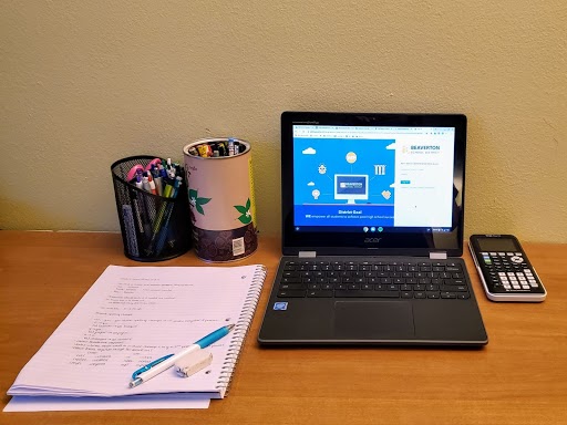 A workspace is set up at a student's home.