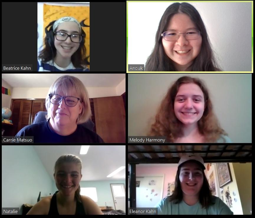 The Hummer team smiles together during a Zoom meeting.