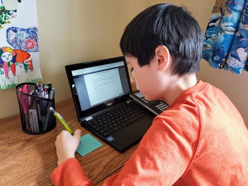 A student delves into math at home.