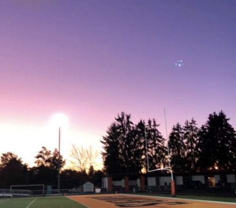 The sun sets over the Beaverton High School football field.
