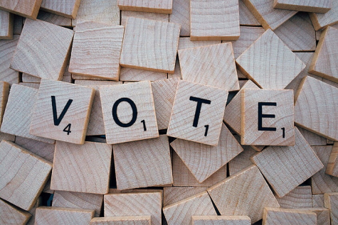 Scrabble tiles spell the word “Vote.”