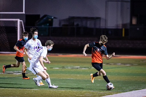 The Beaverton boys soccer team battles Sunset in a game in April