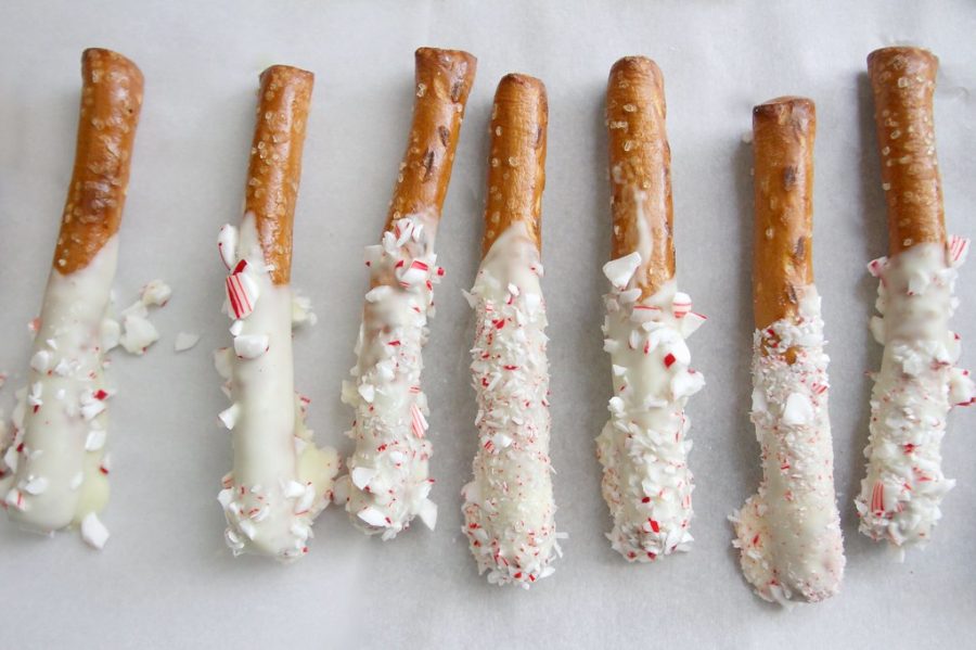 These white chocolate peppermint-dipped pretzels are one of many holiday treats that lactose-intolerant people must avoid during the season.