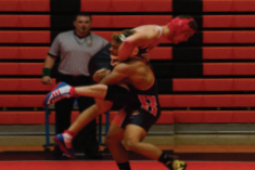 Joseph Espero throws his partner on the ground for a take down on Wednesday December 9th at home.