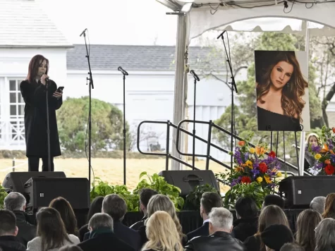 Priscilla Presley speaks to the gathering at Lisa Marie Presleys funeral. 