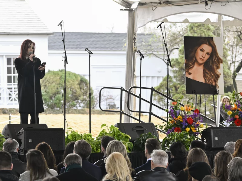 Priscilla Presley speaks to the gathering at Lisa Marie Presleys funeral. 