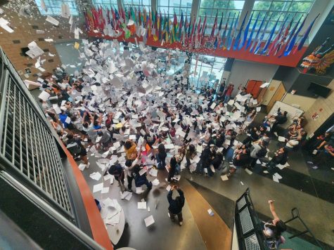 Seniors tossed their papers into the air. 