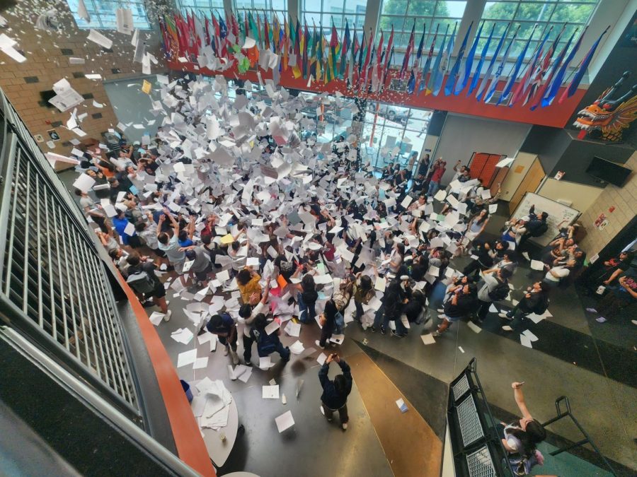 Seniors tossed their papers into the air. 